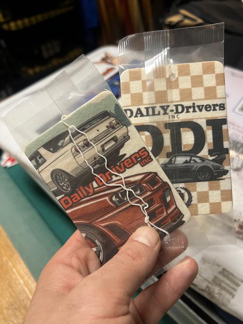 A display of classic best-selling car air fresheners like new car and black cherry